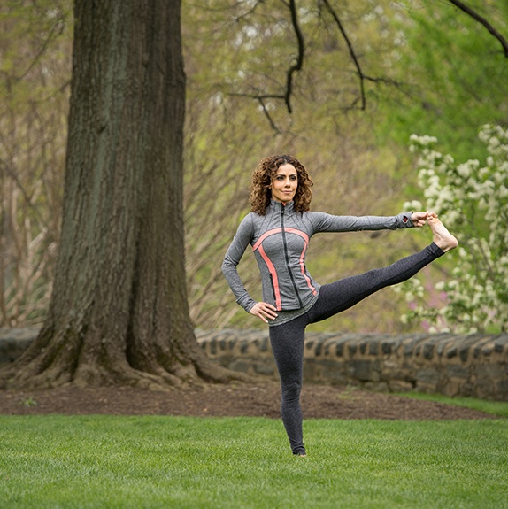 Kathy Jalali Extended Tree Pose in the Grass